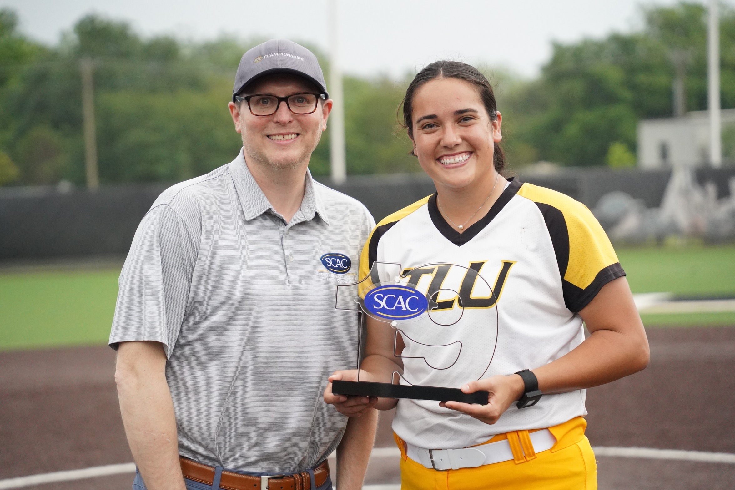 Sydney Ouellette with SCAC Assistant Commissioner Russell Kramer (photo by Bryce Hayes)