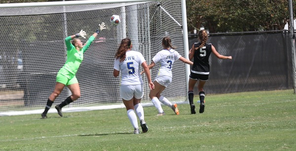 Josie Fountain (5) scores Sunday against Johnson & Wales. (Photo by Becca Barlow)