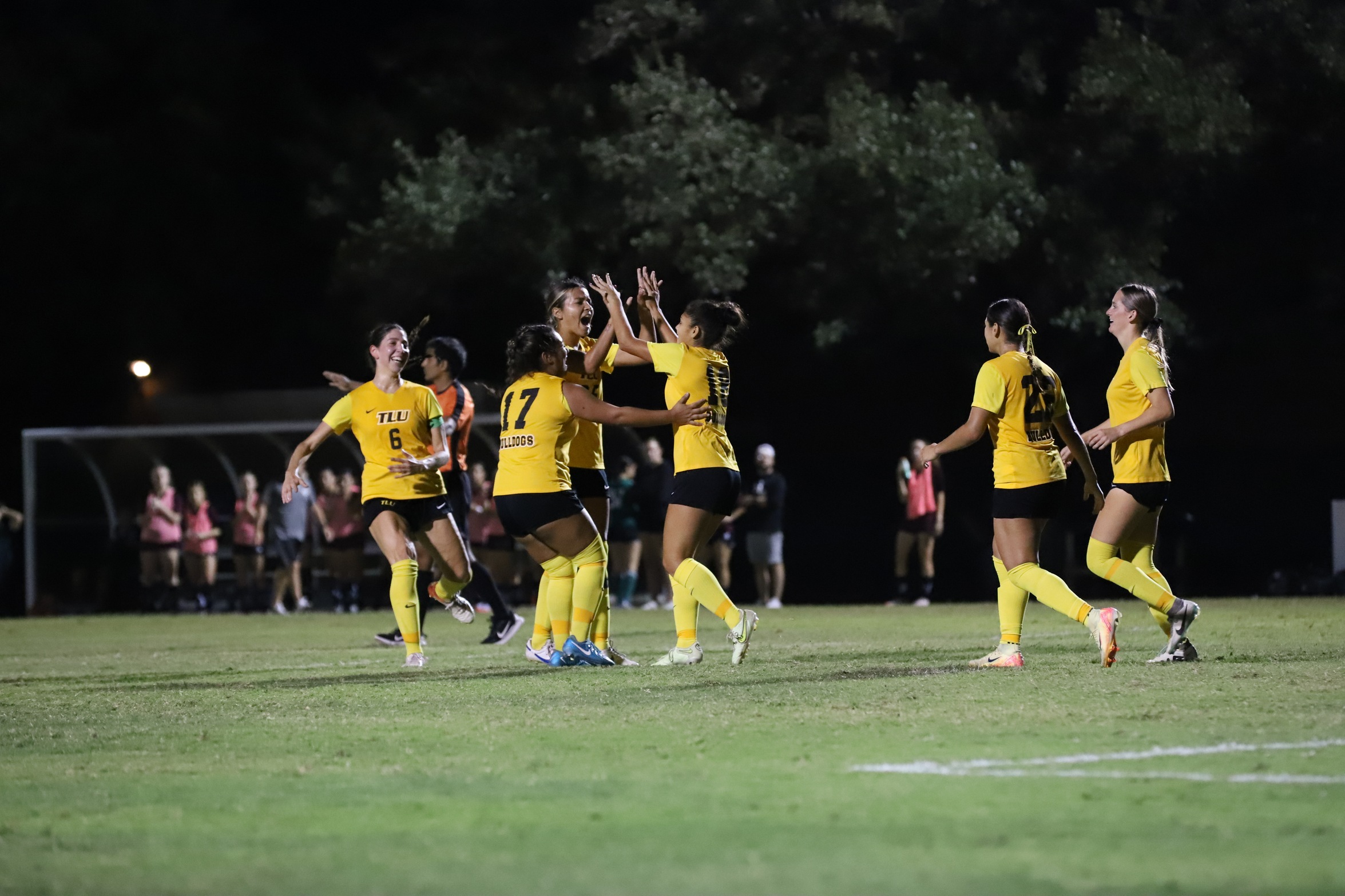 Emma Alvarado (18) and Alyssa Simien celebrate (photo by Madi Johnson '25)