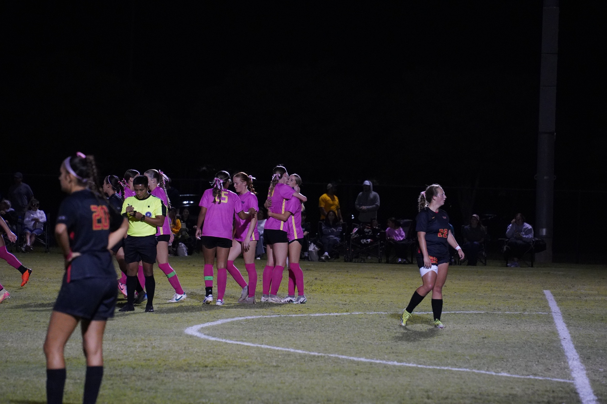 Callie Brame celebrates with Caitlin Roach (photo by Bryce Hayes)